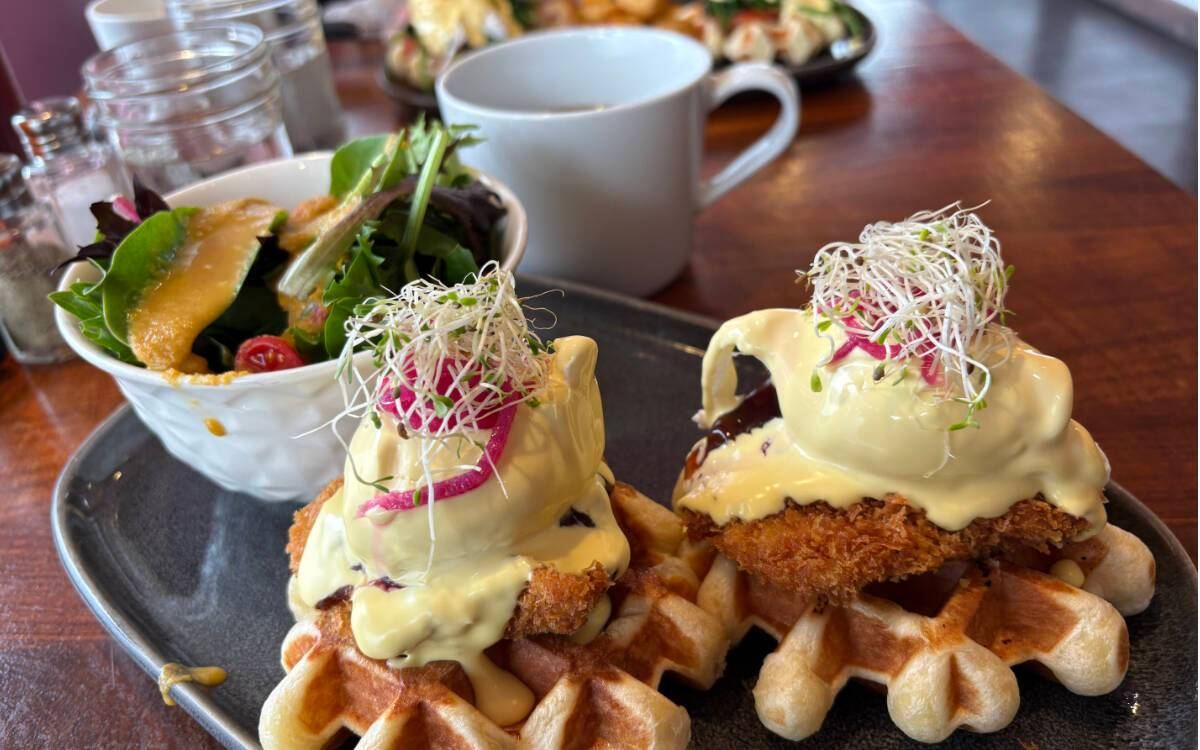 Crispy Cutlet Bennie on Liege waffles with pork cutlet, poached egg, hollandaise and okonomi sauce